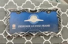 50033 United Pacific License Plate Frame Chrome, Tribal Flame. Fixed Price $26.00.