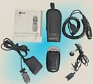 Vintage LG200CB Tracfone Cell Phone Flip With Accessories. Fixed Price $49.95.